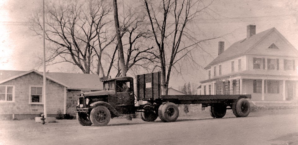 Old Black and White JF Price truck